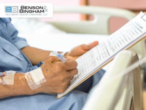 Filling a medical form after getting injured in a Las Vegas car accident